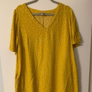 Golden yellow polka dot dress.